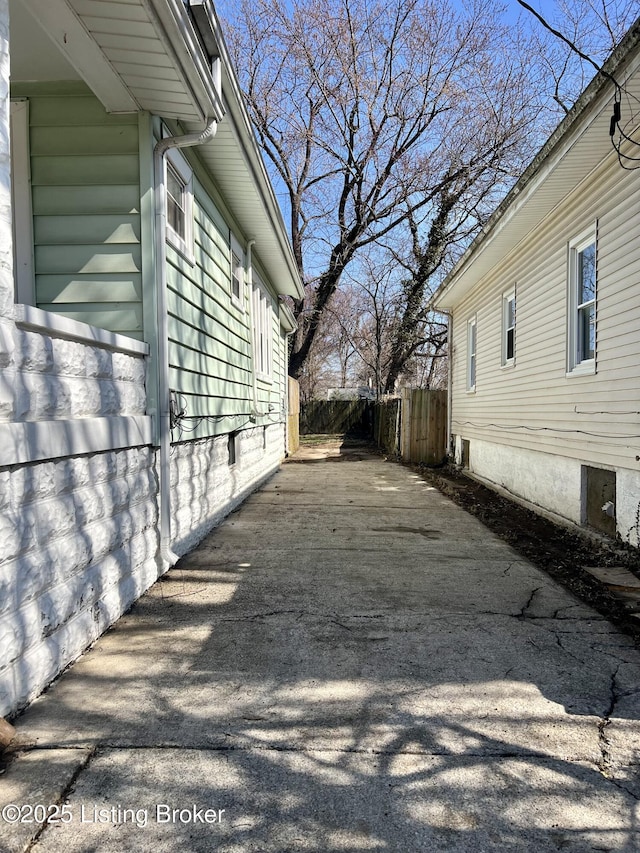 view of side of property with fence