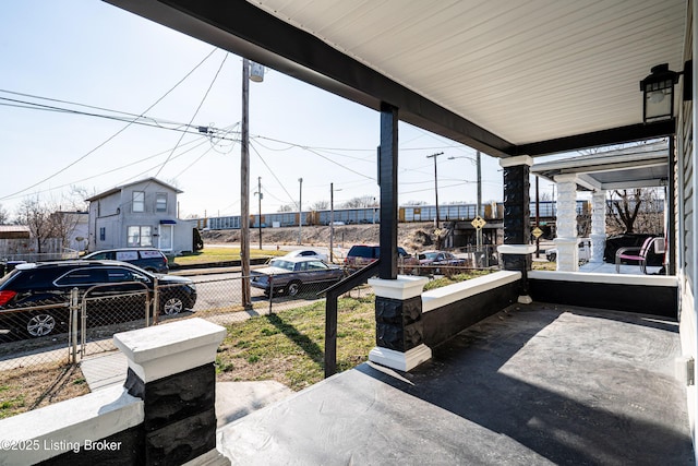 view of patio / terrace featuring fence