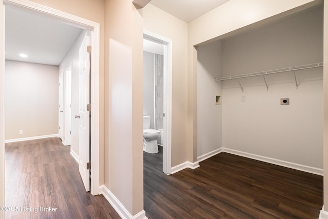 washroom with baseboards, laundry area, hookup for a washing machine, electric dryer hookup, and dark wood-style flooring