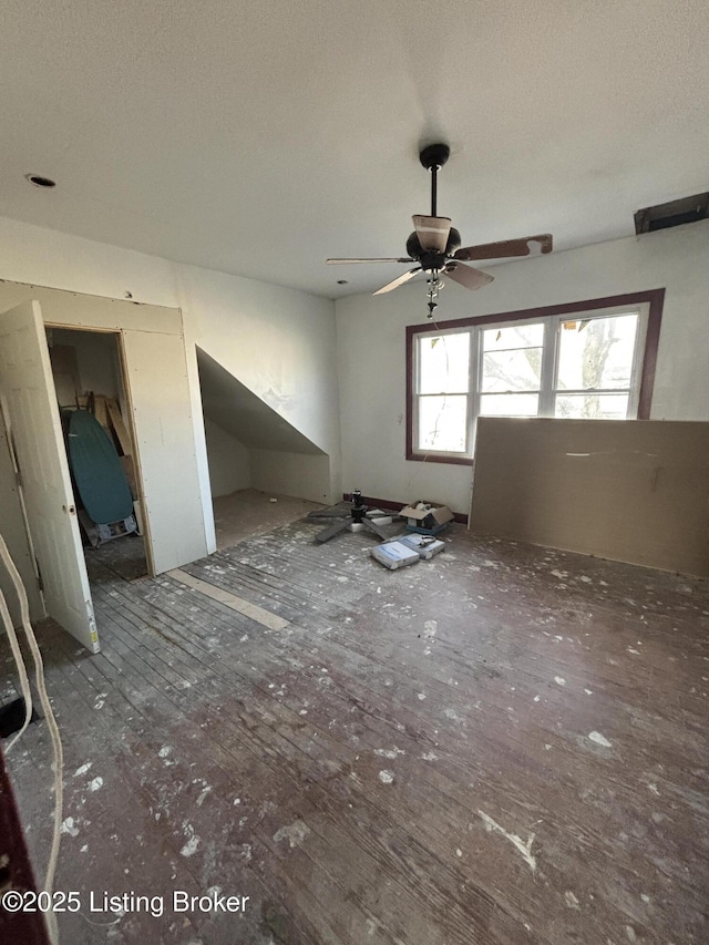 unfurnished room featuring a textured ceiling