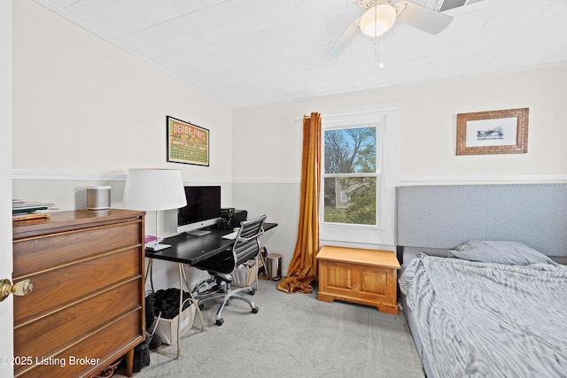 carpeted bedroom with a ceiling fan