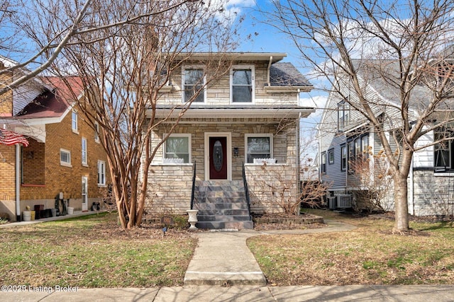 view of front of property featuring covered porch, central AC unit, and stone siding