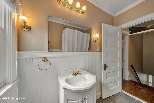 full bath featuring vanity, crown molding, and curtained shower