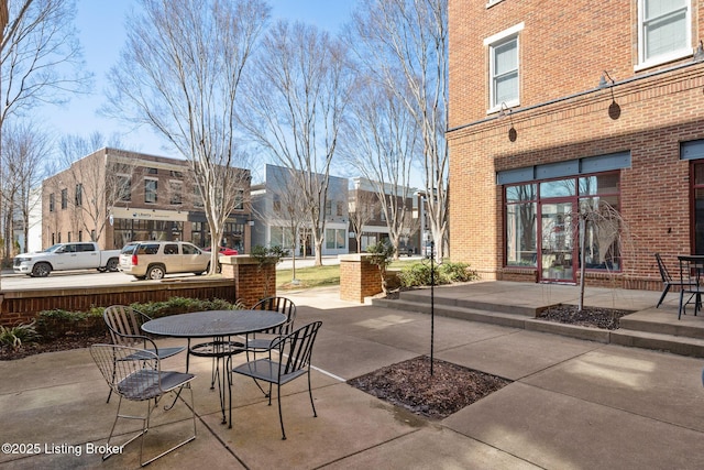 view of patio with outdoor dining area