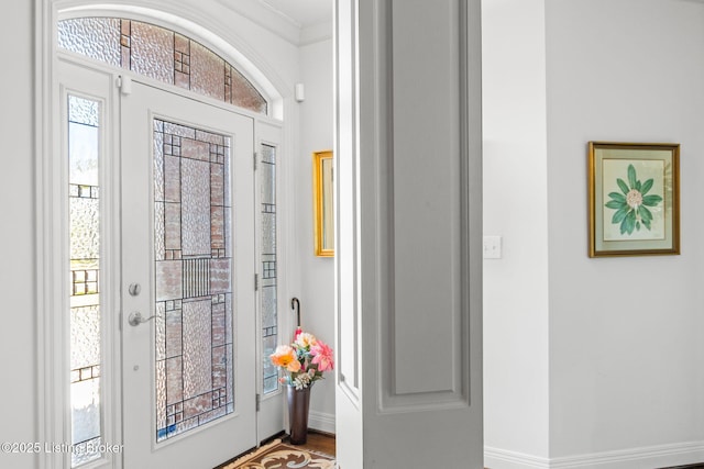 entrance foyer featuring baseboards