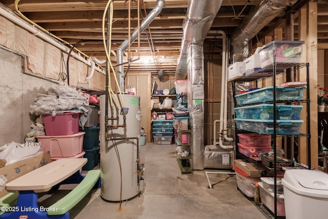 unfinished basement featuring water heater