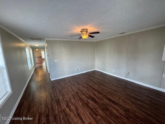 unfurnished room with dark wood finished floors, crown molding, ceiling fan, and a textured ceiling