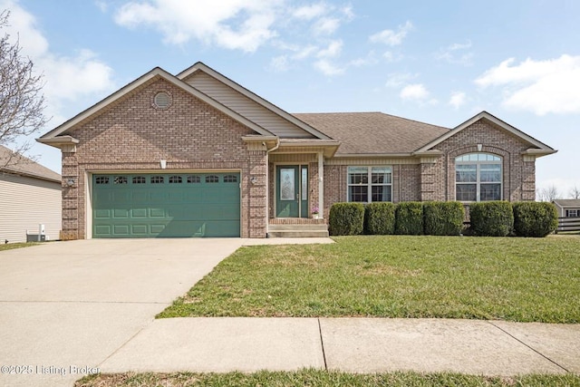 single story home with a garage, driveway, brick siding, and a front lawn