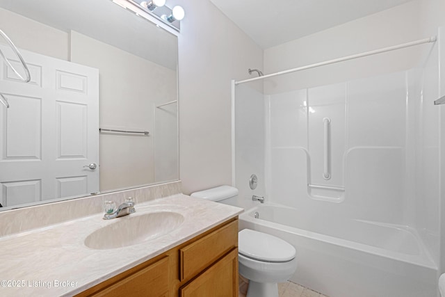 bathroom featuring shower / bathtub combination, toilet, and vanity