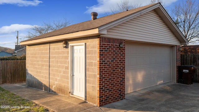 detached garage with fence