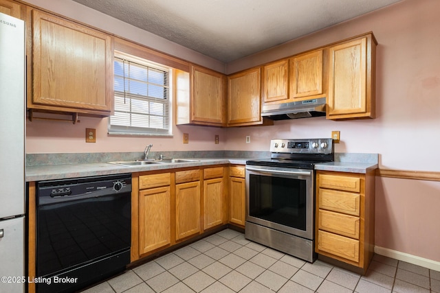 kitchen with stainless steel electric range oven, freestanding refrigerator, a sink, black dishwasher, and under cabinet range hood