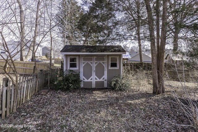 view of shed featuring a fenced backyard