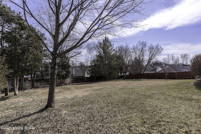 view of yard featuring fence