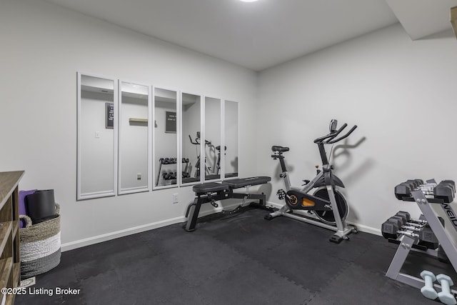 exercise room with baseboards