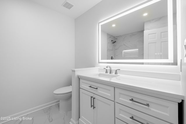 bathroom featuring a marble finish shower, visible vents, toilet, marble finish floor, and vanity