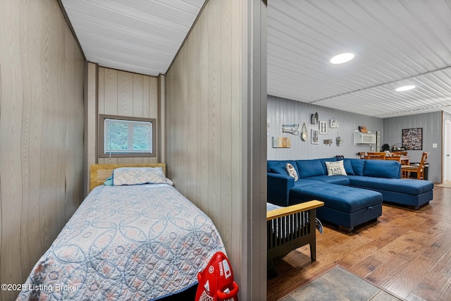 bedroom featuring wood finished floors