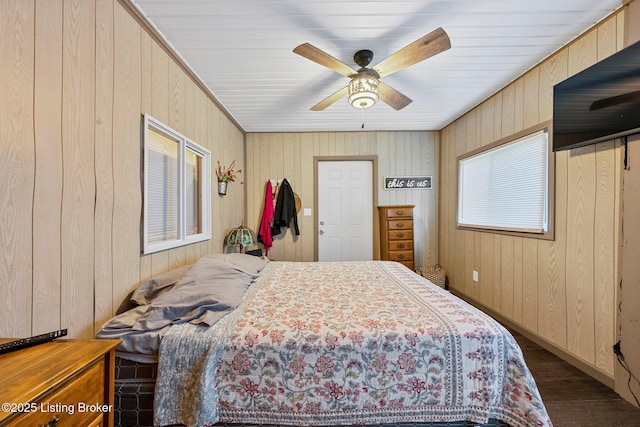 bedroom with dark wood finished floors and a ceiling fan