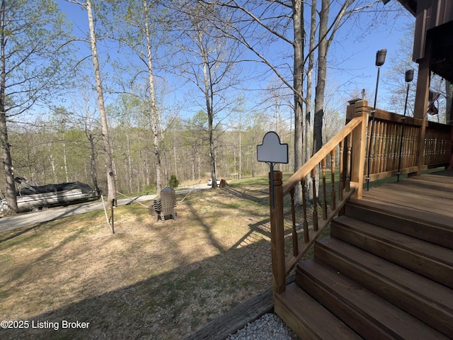 view of yard with a wooden deck