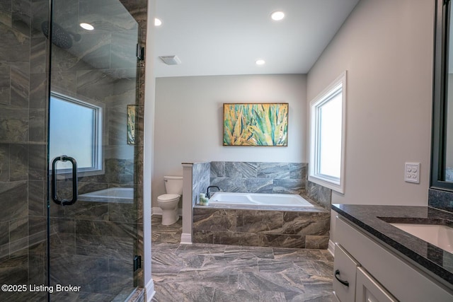 full bath featuring a shower stall, toilet, a garden tub, marble finish floor, and vanity