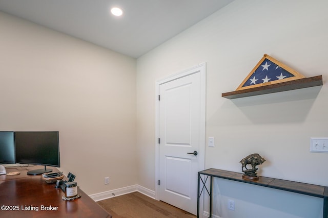 office space featuring recessed lighting, baseboards, and wood finished floors