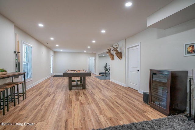 rec room with recessed lighting, light wood-type flooring, and baseboards