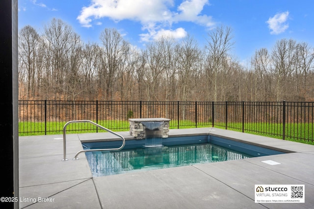 view of pool with a patio and a fenced backyard