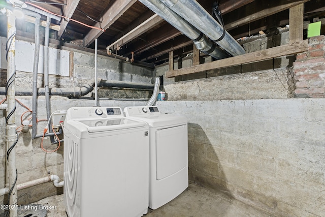 laundry area featuring laundry area and washing machine and clothes dryer