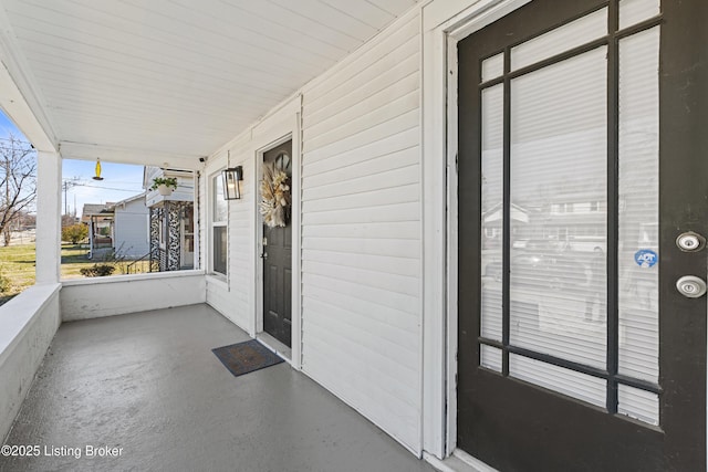 view of patio featuring a porch