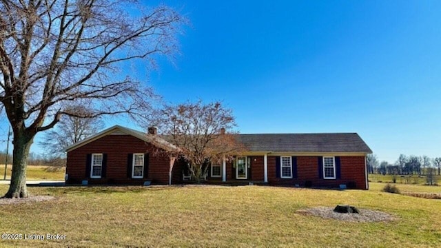 ranch-style home with a front yard