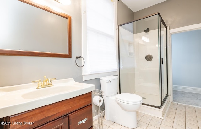 full bathroom with vanity, toilet, a stall shower, and tile patterned flooring