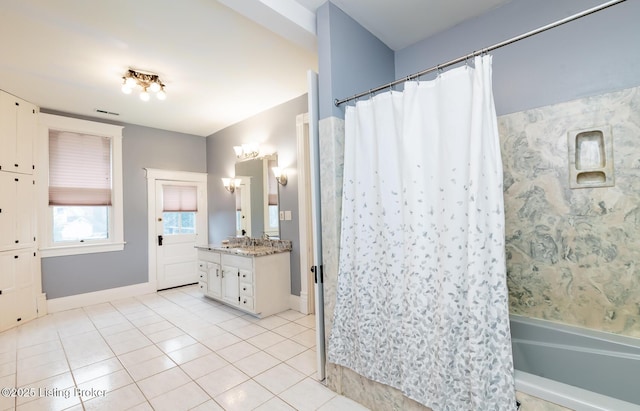 full bath featuring tile patterned floors, visible vents, vanity, and shower / bath combo