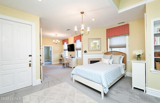 bedroom featuring an inviting chandelier, carpet flooring, baseboards, and visible vents