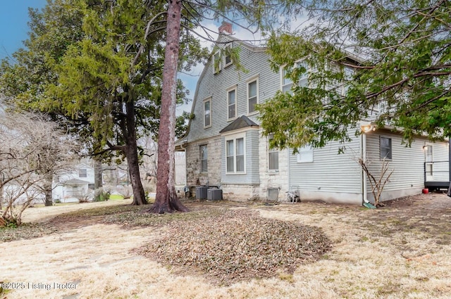 view of home's exterior with central air condition unit