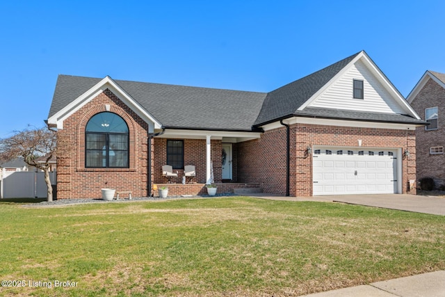 view of front of property with covered porch, concrete driveway, a front yard, roof with shingles, and brick siding