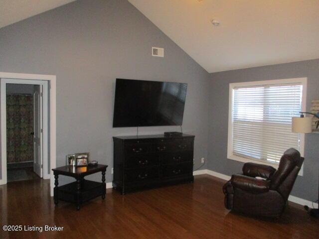 111 Pete Ln, Bardstown, KY 40004 - living room featuring high vaulted ceiling, wood finished floors, visible vents, and baseboards