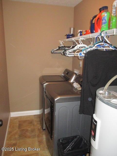 111 Pete Ln, Bardstown, KY 40004 - clothes washing area featuring laundry area, separate washer and dryer, water heater, and baseboards