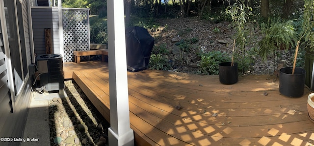 deck with cooling unit and grilling area