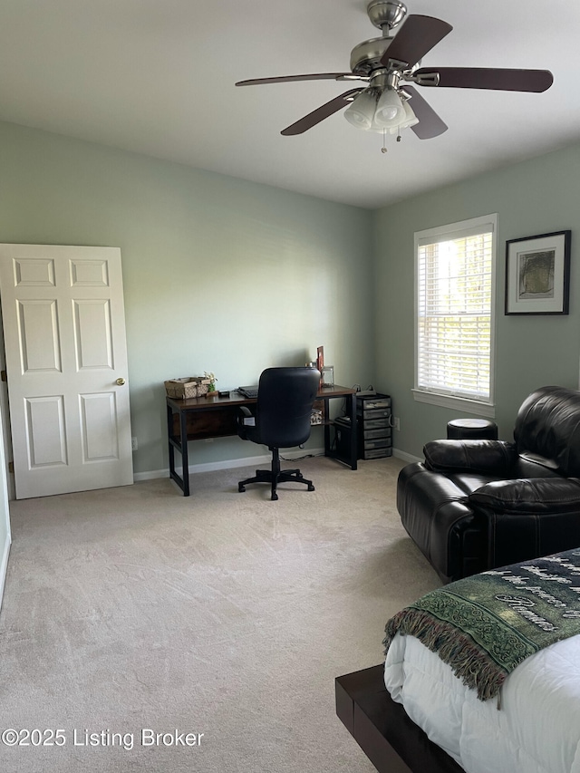 bedroom featuring baseboards, carpet, and ceiling fan