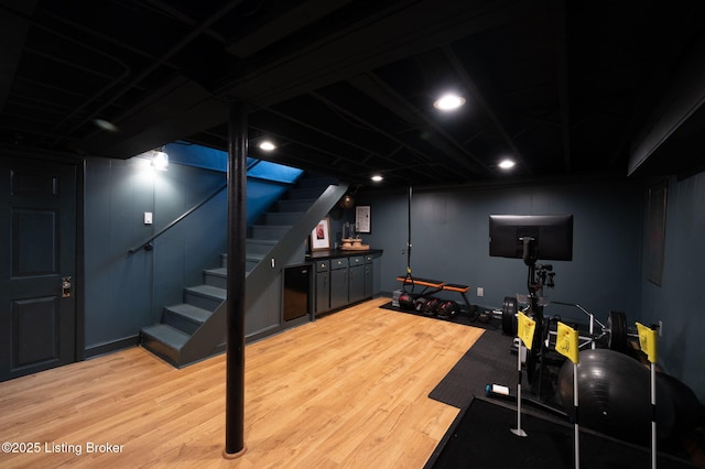 workout room with wood finished floors