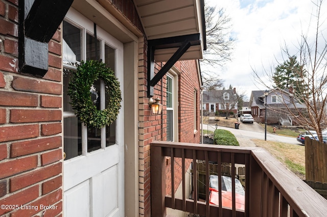 balcony featuring a residential view