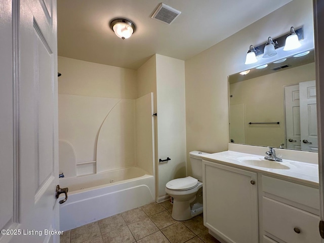 bathroom with visible vents, toilet, vanity, and tile patterned flooring