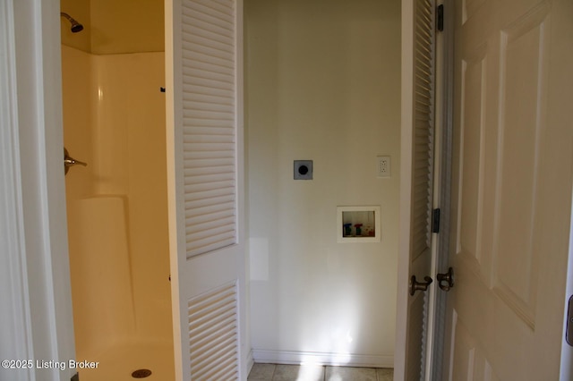 washroom featuring washer hookup, baseboards, and hookup for an electric dryer