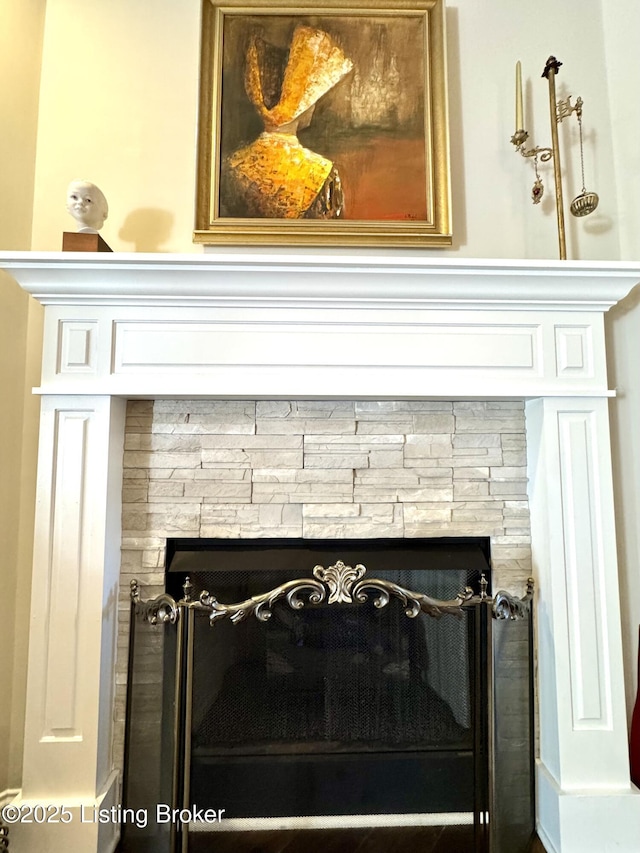 room details with a stone fireplace