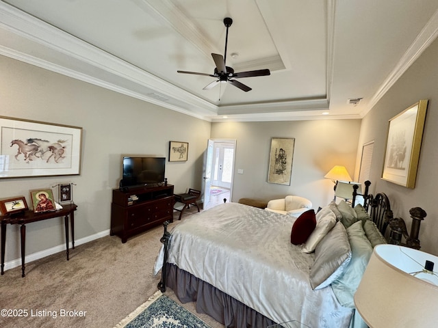 bedroom featuring visible vents, ornamental molding, baseboards, a raised ceiling, and light colored carpet