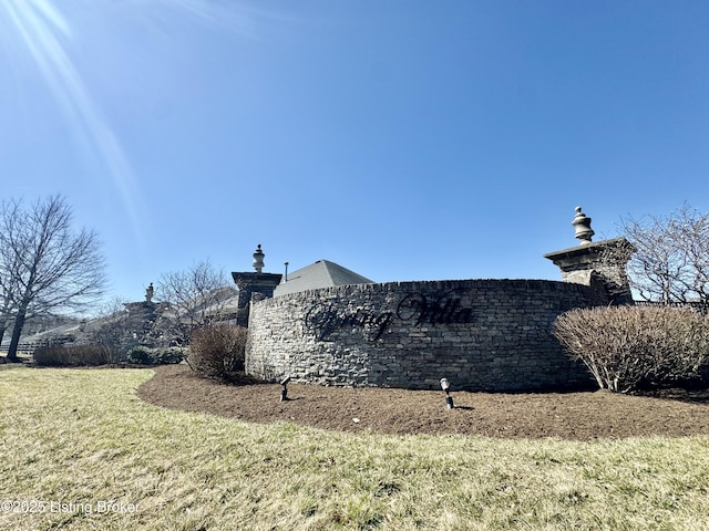 view of property exterior featuring a yard and a chimney