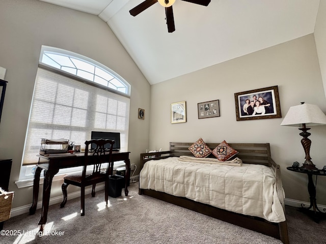 carpeted bedroom featuring lofted ceiling, baseboards, and ceiling fan