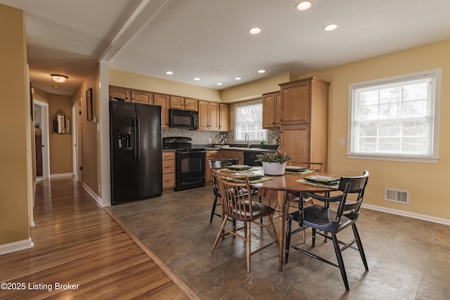 dining space featuring recessed lighting, visible vents, baseboards, and dark wood-style floors