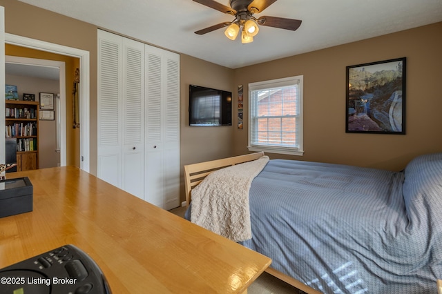 bedroom featuring a closet and a ceiling fan