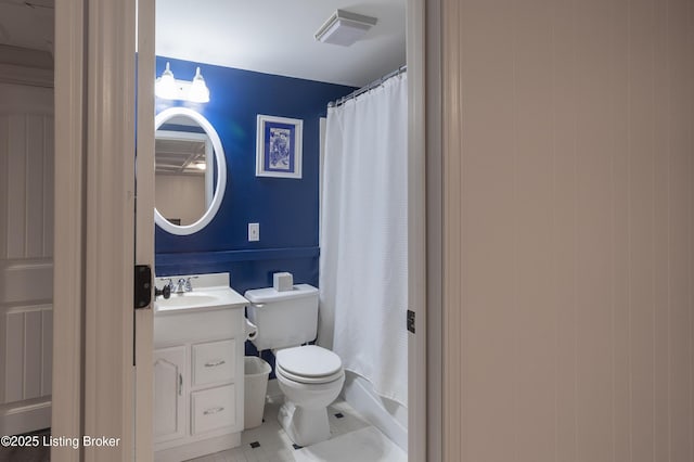 bathroom with vanity, toilet, a shower with curtain, and tile patterned flooring