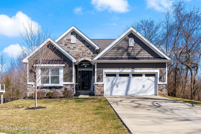 craftsman house featuring stone siding, a garage, driveway, and a front yard